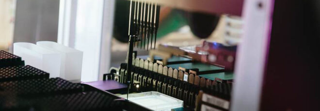 Needles poking a clear tray