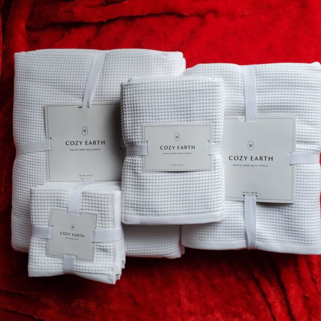 Four varying sizes of bath towels