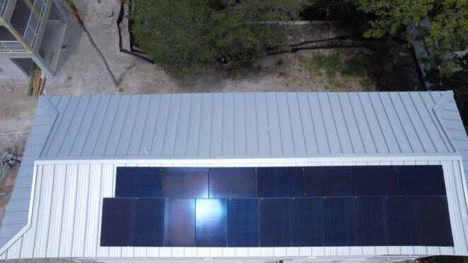 The top of solar panels on a building