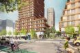 A gathering space between high-rise buildings where people are walking and biking