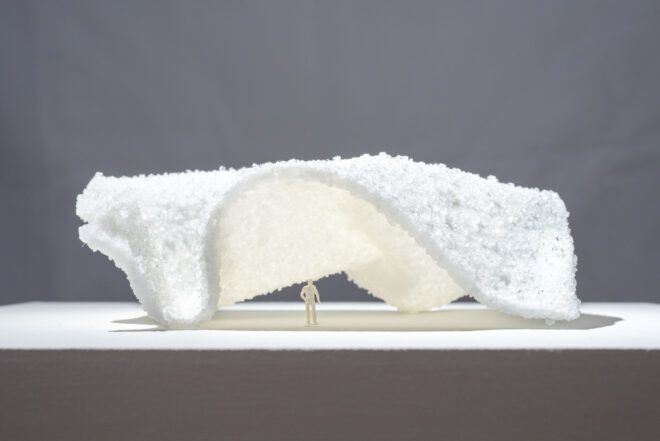 A wavy white sculpture piece