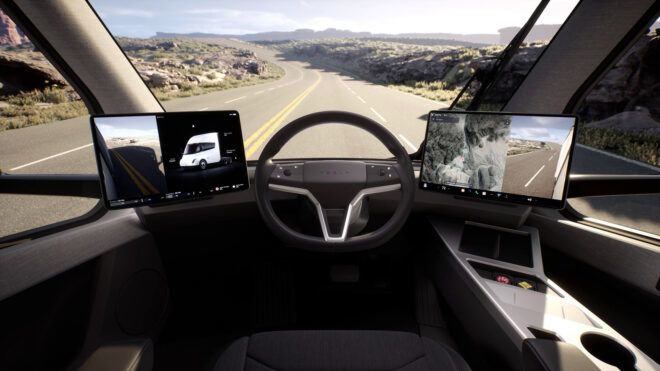 An interior steering with two screens on either side of it to the front window