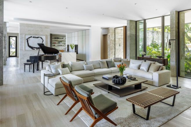 Wraparound couch in living room of residence