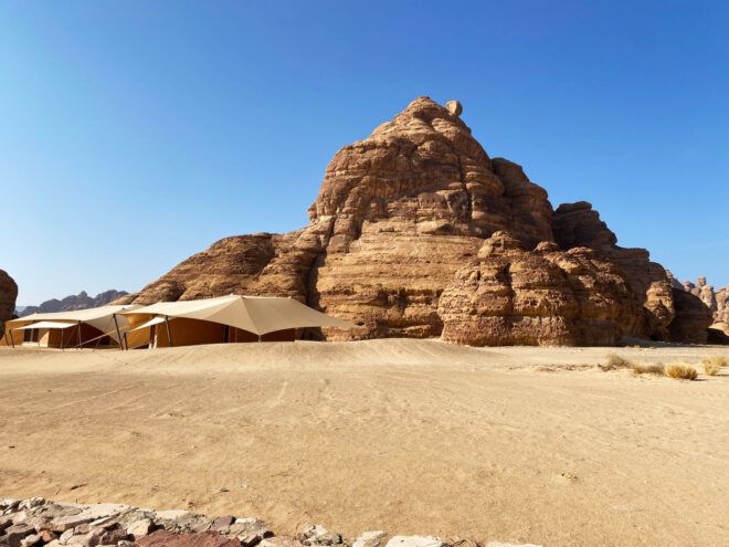 Tall rock mountains behind resort