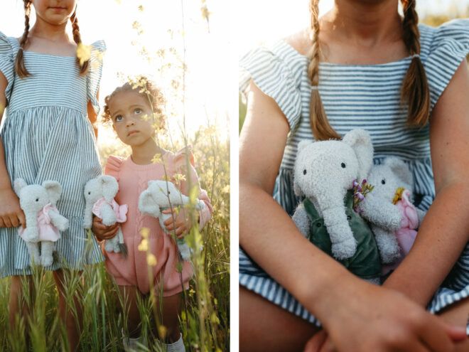 Simple stuffed animal elephants in a field