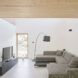 Gray couch and timber ceiling living room