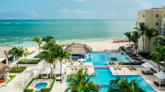 Beach hotel with pools and ocean ahead