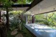 A glass window separating the outside and inside of the building