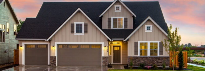 Modern house at dusk with garage