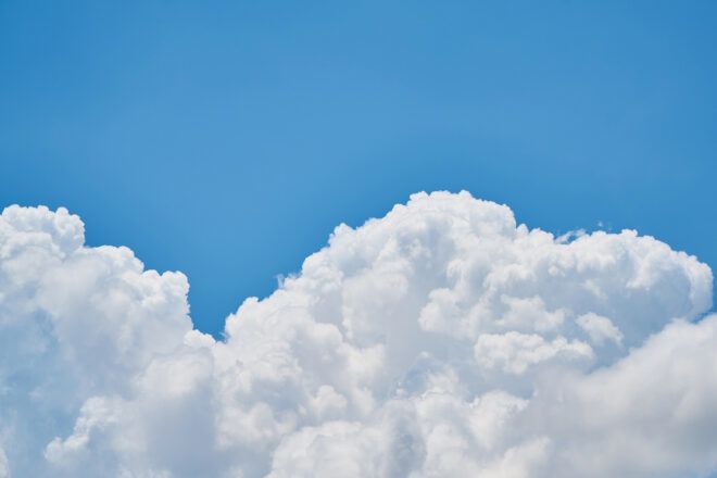 White clouds against a blue sky