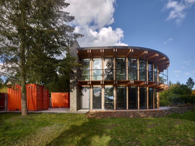 A rounded house with window panels