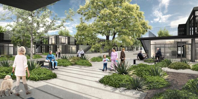 Pedestrians walking into a housing community