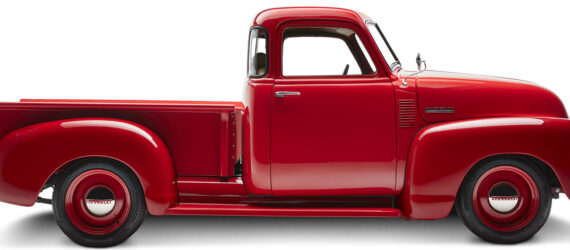 The side of a red Chevrolet