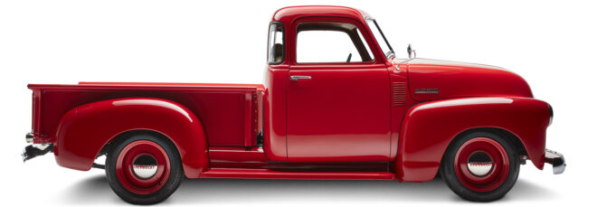 The side of a red Chevrolet