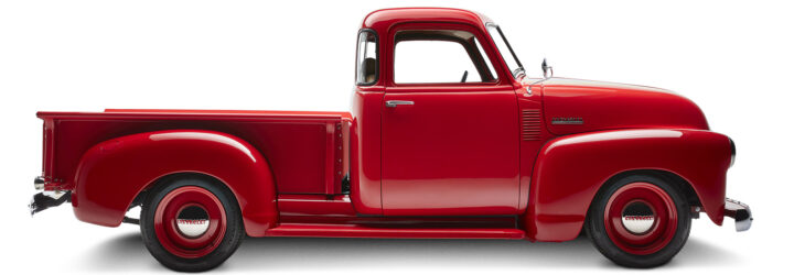 The side of a red Chevrolet