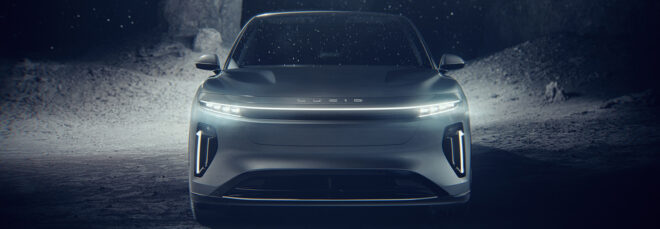 The front of a silver SUV EV vehicle