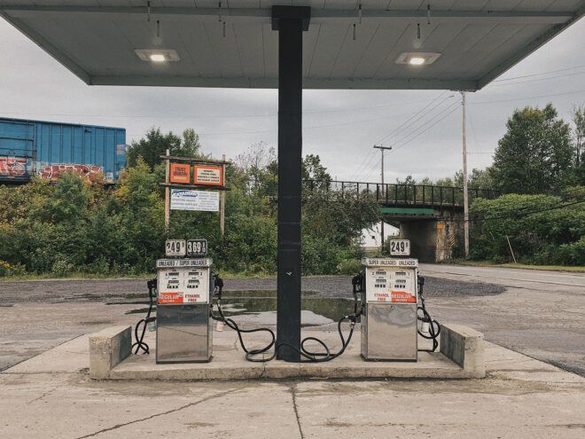 Two gas pumps at a gas station