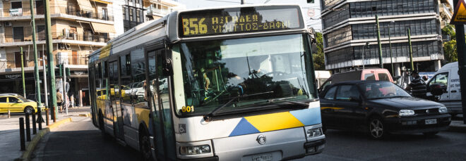 A public bus on the side of the road