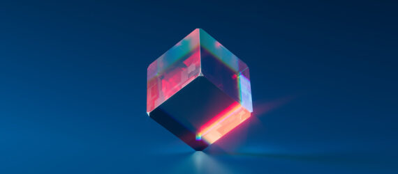 A glass cube balanced on its corner
