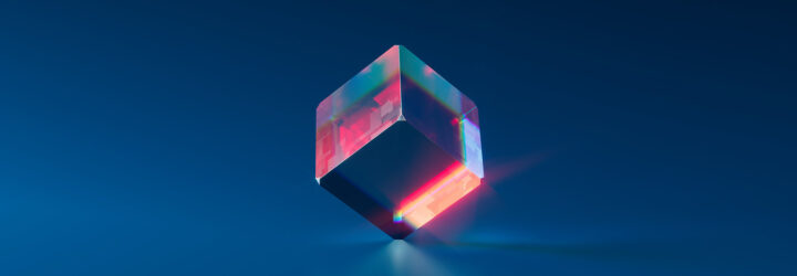 A glass cube balanced on its corner