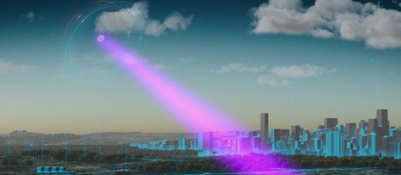 A purple beam from the sky shining on a city
