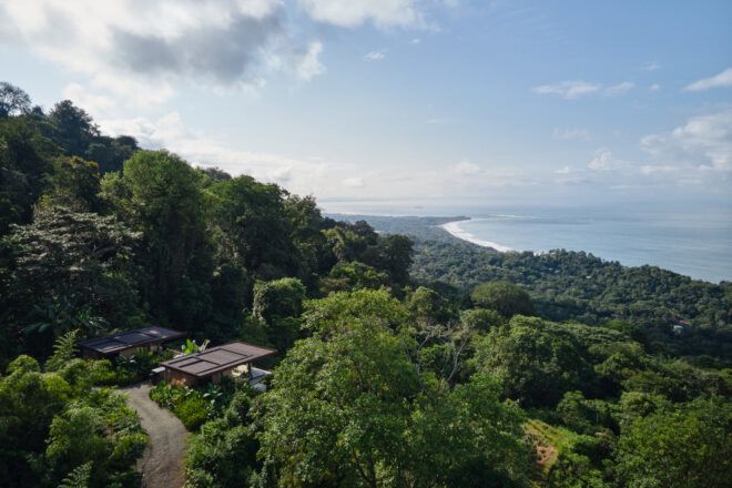 Two villas on a hill overlooking the ocean