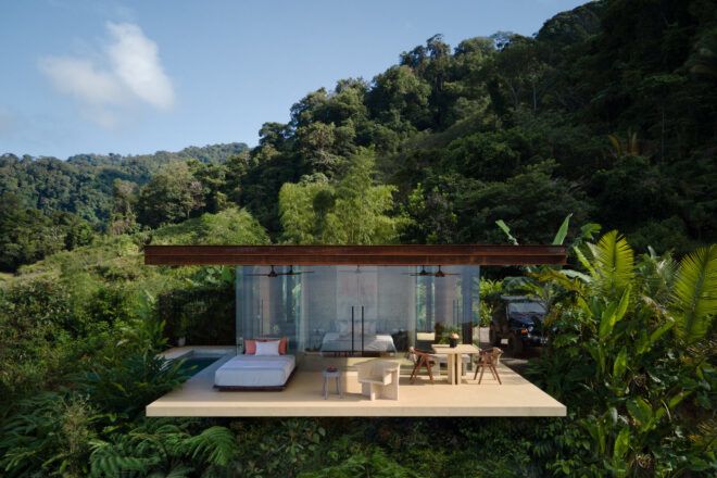Aerial view of a modern villa on a tropical hill