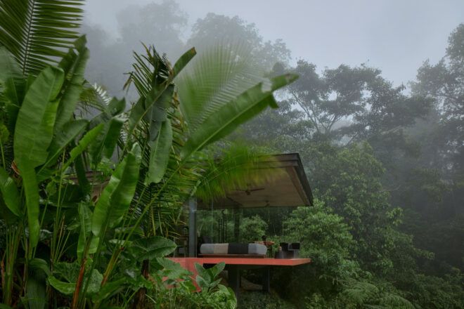 Side facade of modern villa on a rainy day