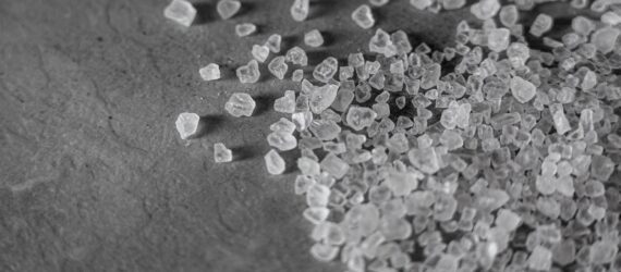 A black and white photo of salt granules