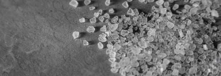 A black and white photo of salt granules