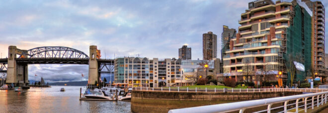 Vancouver waterfront with housing developments and a bridge in the background