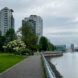 Park along Vancouver waterfront with high rise buildings in the background