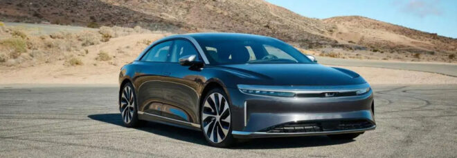 A sleek black EV vehicle parked on a street