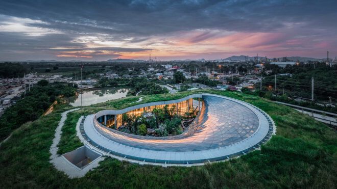 A curved building within a city