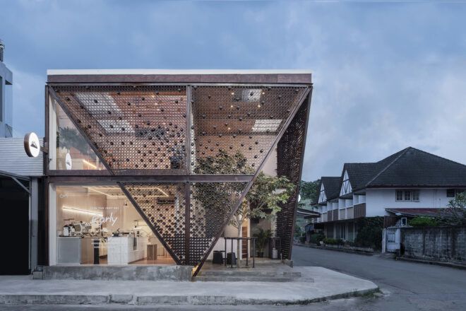 A cafe with an interesting upside down triangle wire design in the front