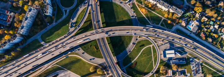 An aerial view of a highway intersecting with highways underneath