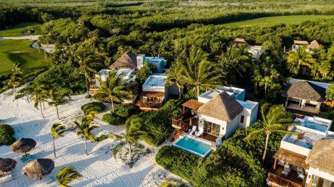 A drone view of a resort along a beach