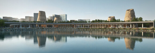 View across a large water body to the library and museum complex