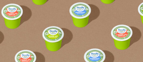 Rows of green compostable coffee pods