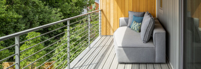 Grey sofa in a covered terrace