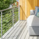 Grey sofa in a covered terrace
