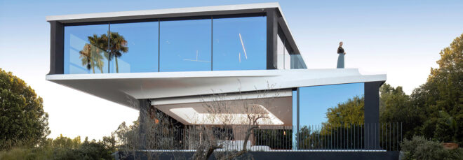 A two story geometric shaped modern home