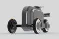 A gray metal three-wheel robot