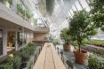 A dining hall underneath walls of glass