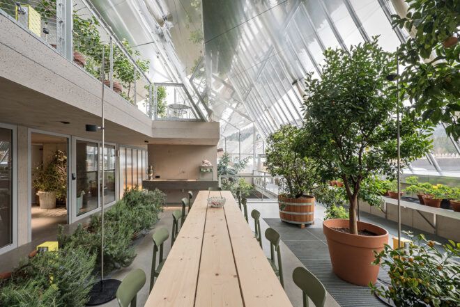 A dining hall underneath walls of glass