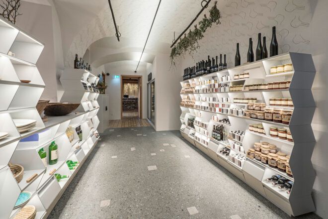 A food pantry with lights lining the shelves
