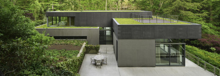 A blocky home with outdoor seating